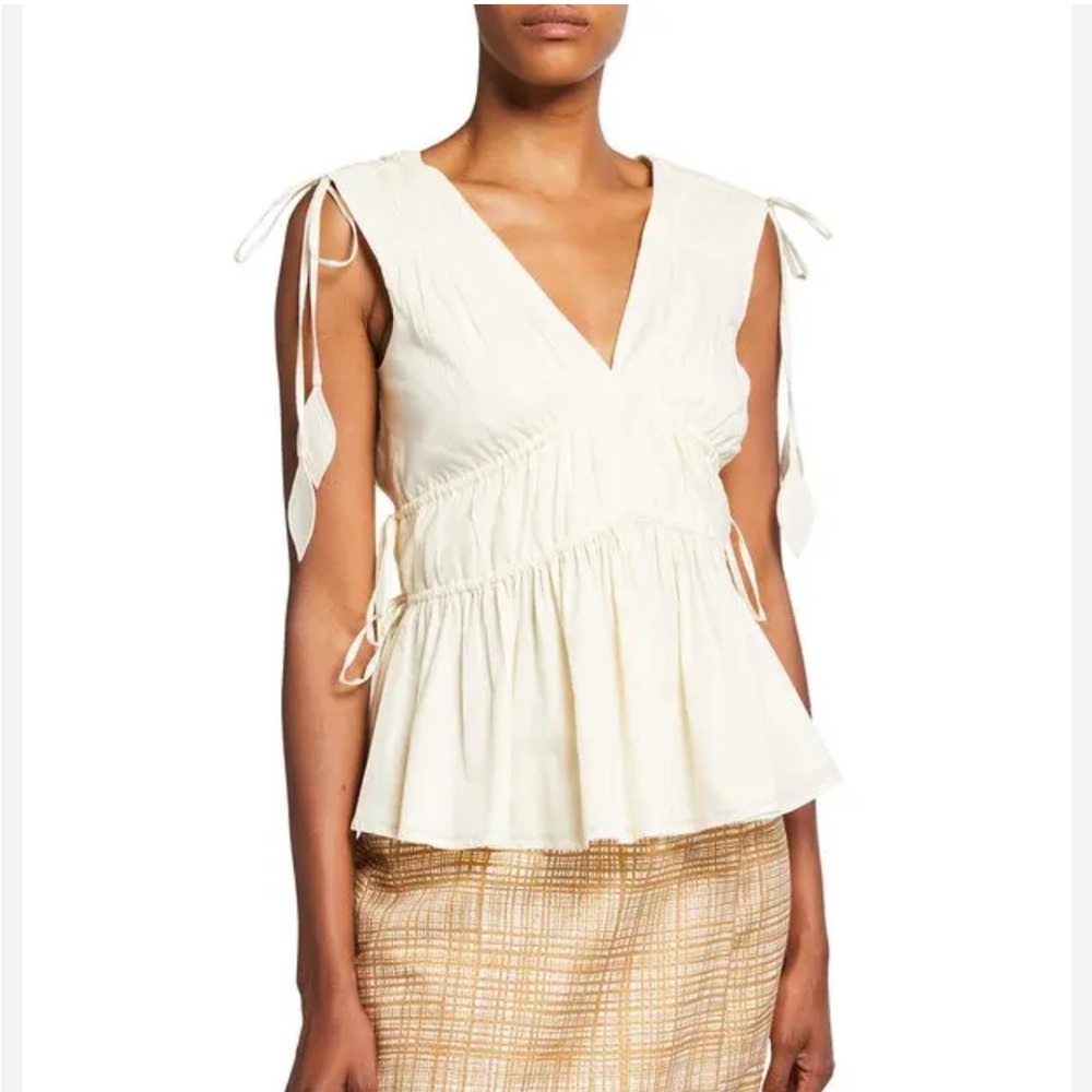 TORY BURCH 
Sleeveless Smocked Peplum Top